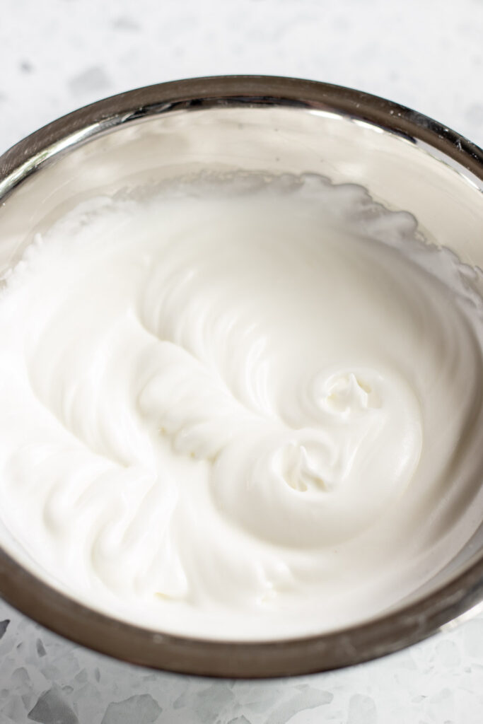 Thick, glossy egg whites beaten to stiff peaks.