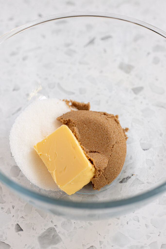 Butter and brown and white sugars in large glass mixing bowl to start the blueberry coffee cake batter