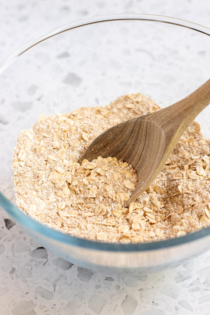 Dry ingredients mixed together with wooden spoon
